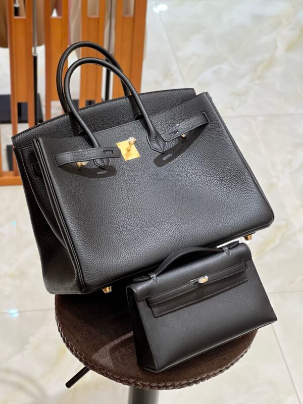 Birkin black Togo leather pochette Swift